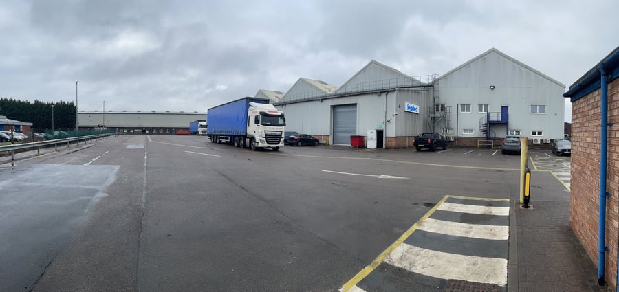 The outdoor loading section of the Leadec warehouse with a lorry waiting to be loaded.
